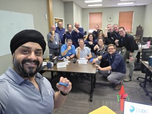 Conquer Leadership team at a workshop with individuals smiling
