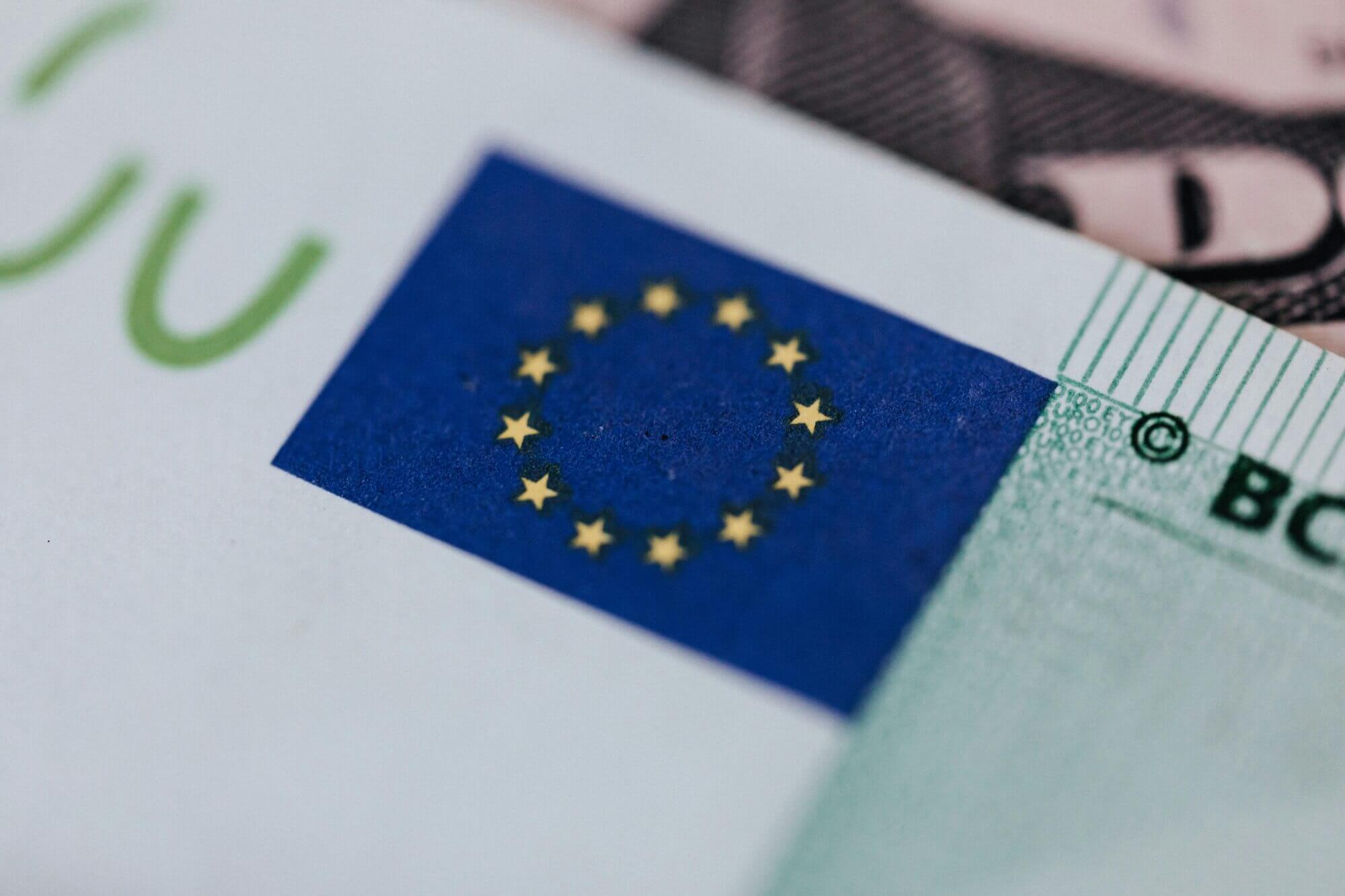 EU flag close up on a passport.
